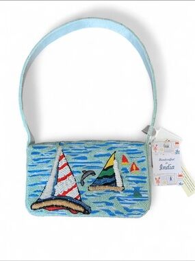 Brand new TJ maxx Marshall’s Beaded Sailboats with dolphin shoulder bag